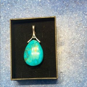 Very nice turquoise pendent.